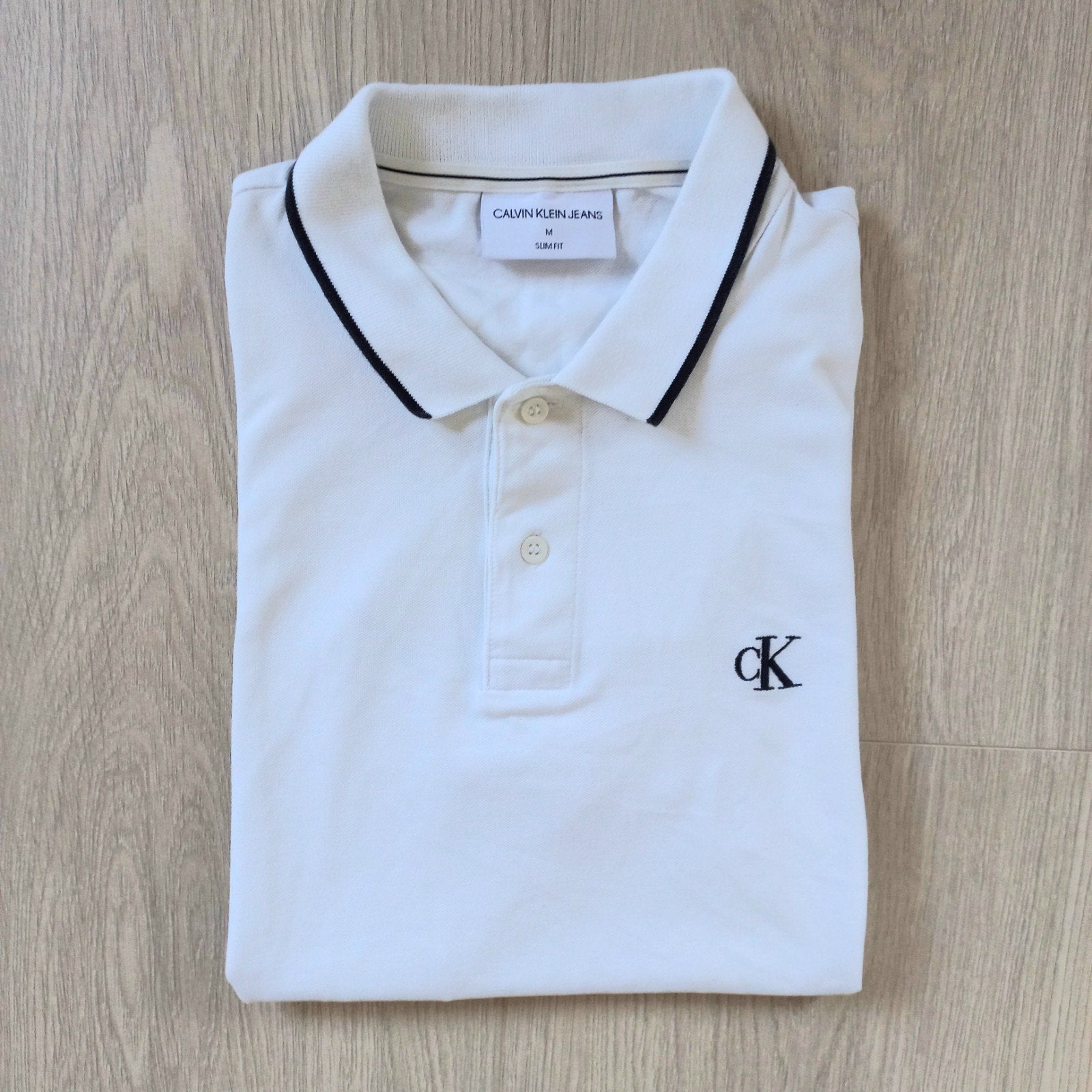 Stijlvolle witte polo Calvin Klein maat M -zeer goede staat, Kleding | Heren, Verzenden, Maat 48/50 (M), Zwart