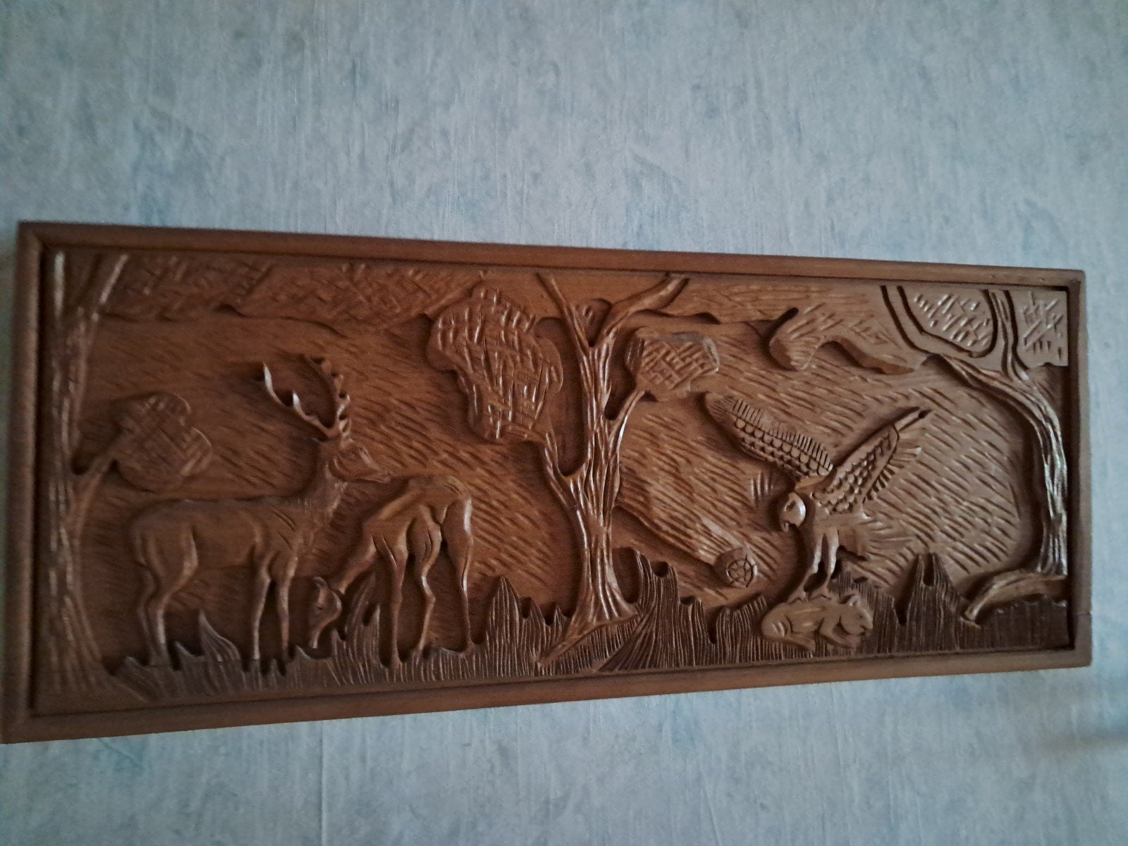 houten.sculptuurwerk, Ophalen