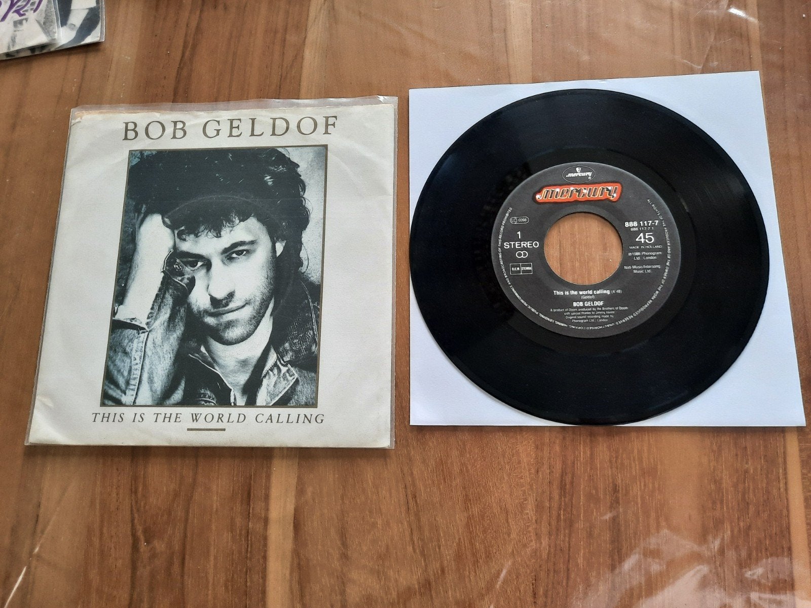 Bob Geldof.This is the world calling-Talk me up., Ophalen of Verzenden
