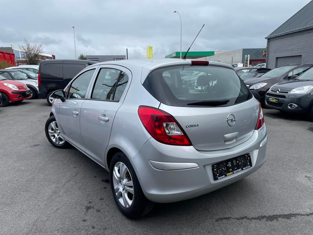 Opel Corsa 1.2 benzine | Airco | GARANTIE •77.435 km•, Auto's, Opel, Stof, 1229 cc, Elektrische ramen, Bedrijf