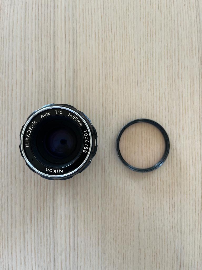 Nikon Nikkor-H Auto 50mm f/2 + uv filter, Ophalen, Gebruikt, Nikon