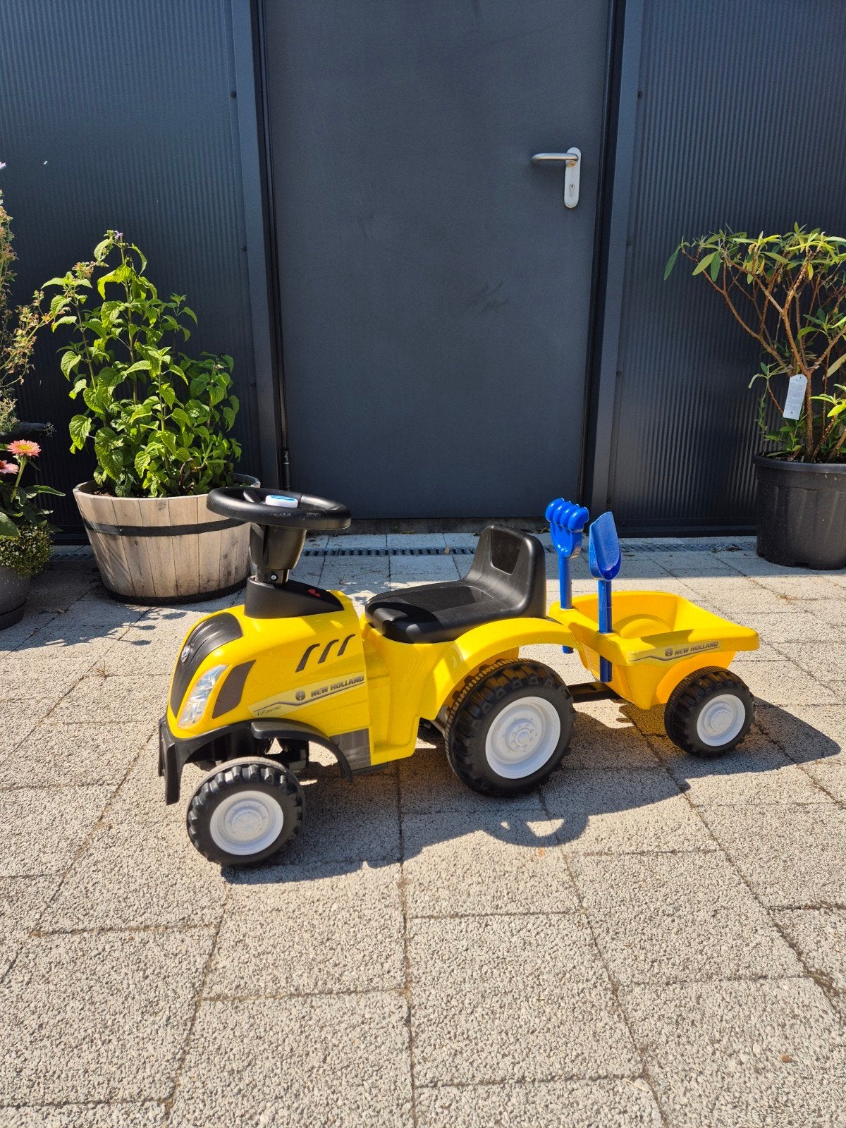 Loopauto tractor met aanhangwagen, Ophalen