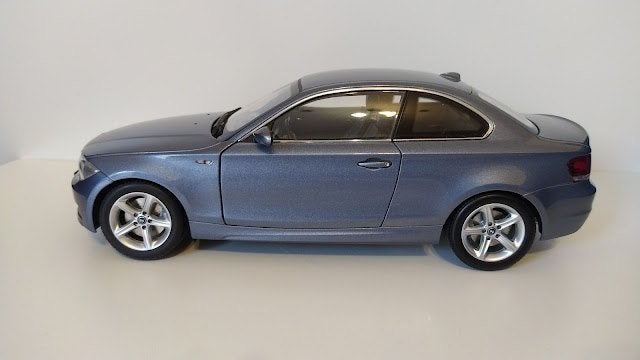 BMW Coupé (E82) kristallblau-met Kyosho 80430427, Enlèvement ou Envoi, Comme neuf, Voiture, Kyosho