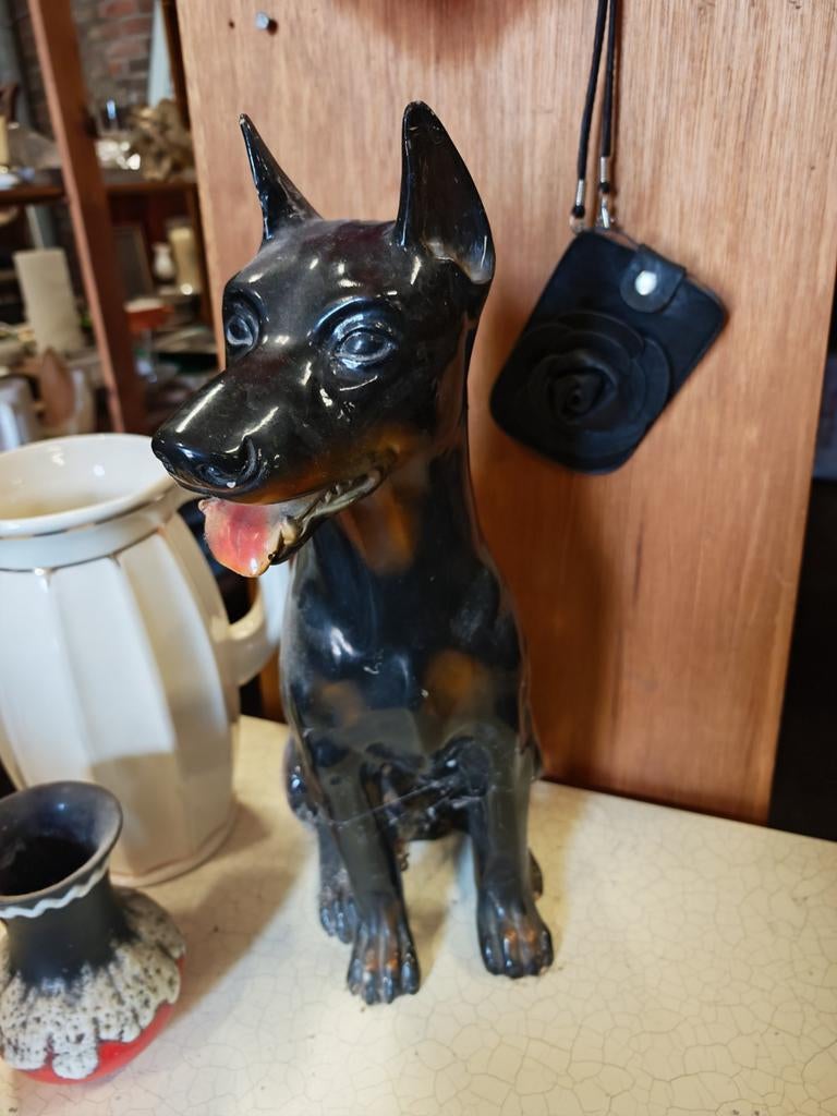 Vintage doberman beeld, Enlèvement