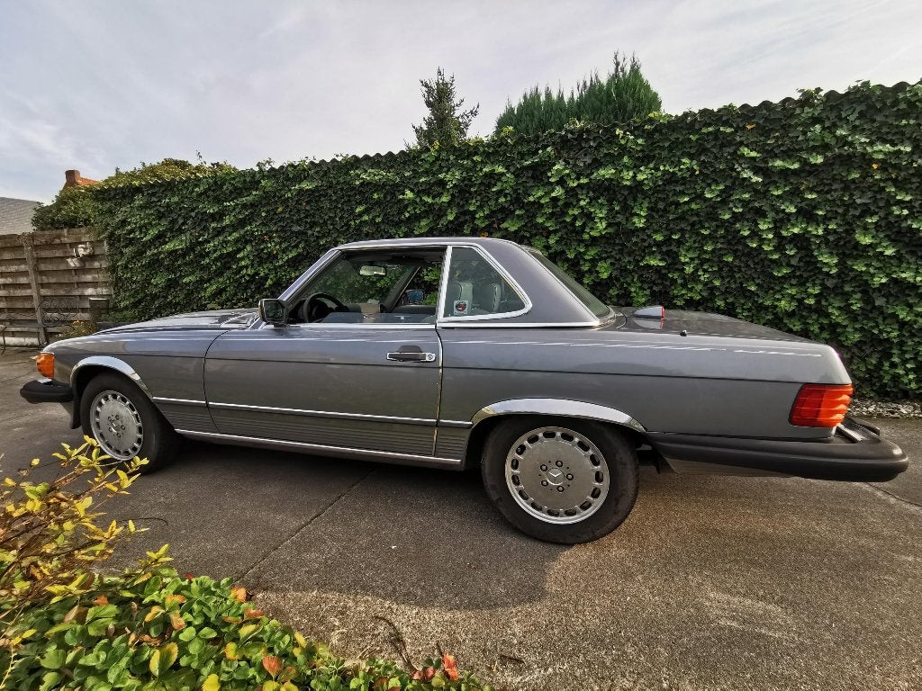 originele Mercedes 560 SL 1e lak van 1987, Auto's, Automaat, Cabriolet, Leder, Grijs