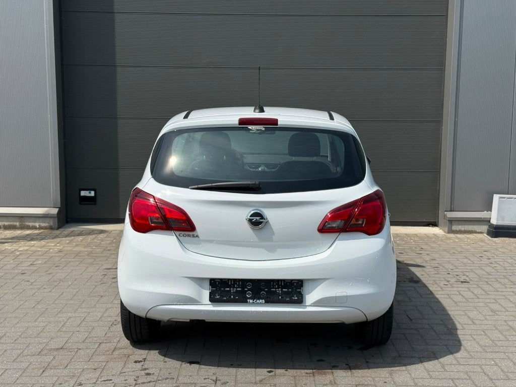 Opel Corsa navigatie cruise controle, Auto's, Voorwielaandrijving, Stof, 4 cilinders, Wit