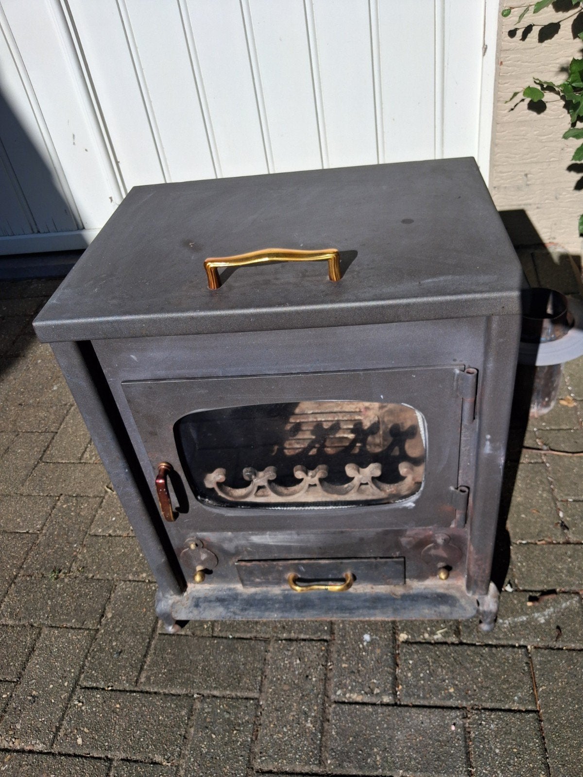 Massieve gietijzeren houtkachel, Ophalen, Houtkachel
