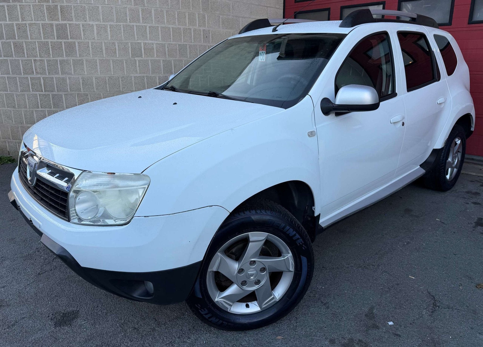 Dacia Duster 1.6i 4x2 Prestige + CLIM (bj 2011), Auto's, Euro 5, 105 pk, Gebruikt, 4 cilinders