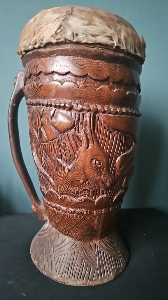 djembe met schapenvel, Ophalen