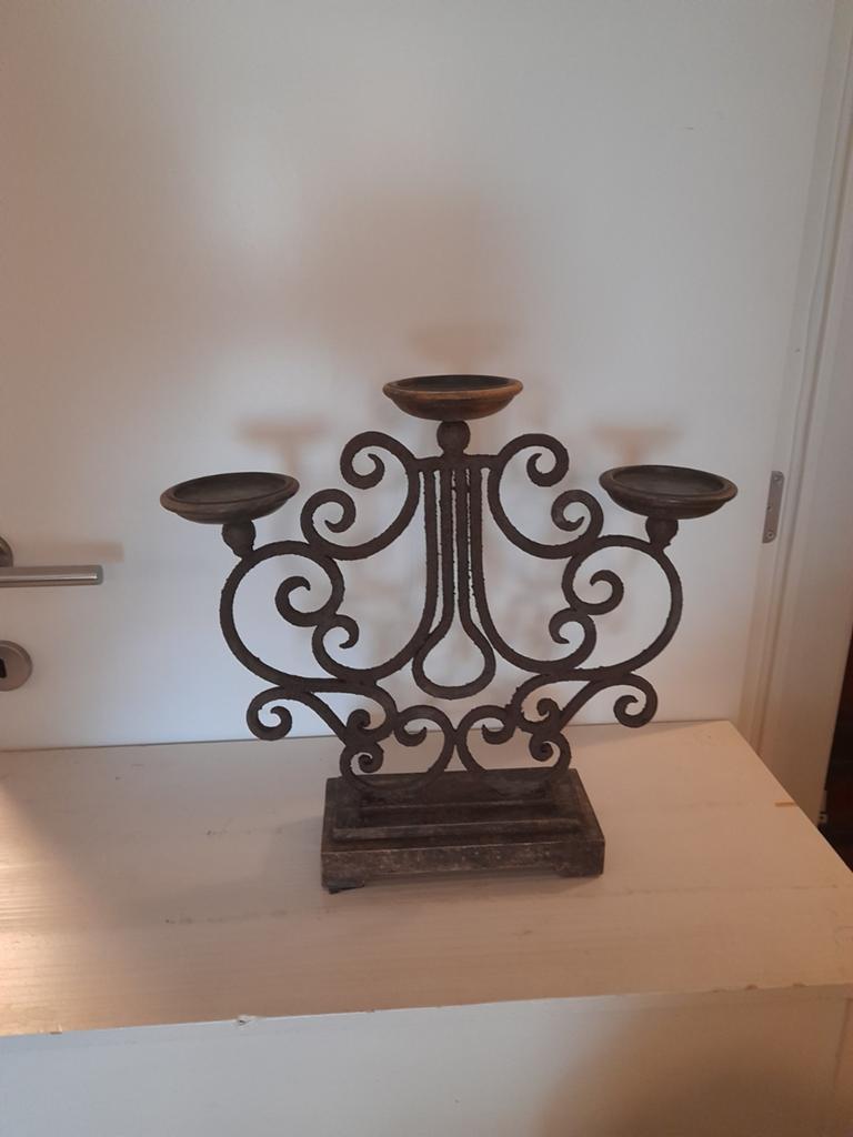 Zware metalen kandelaar zware, Ophalen