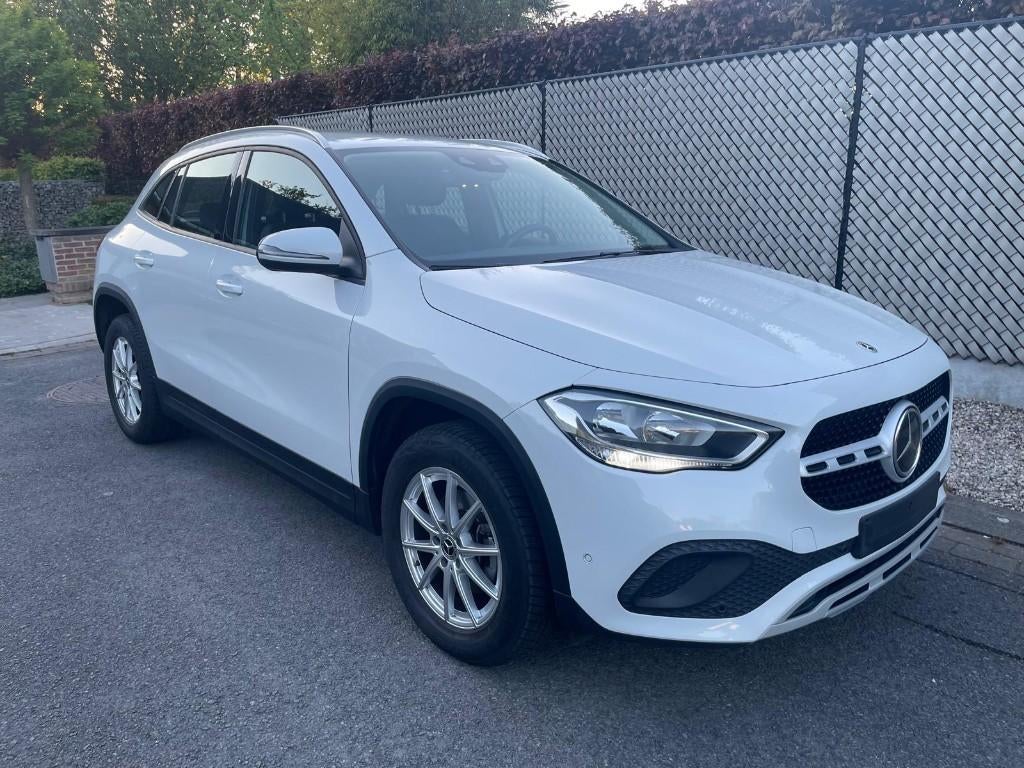 Nieuw Model Mercedes GLA 180 DCT -2021- 12M Garantie, Auto's, Navigatiesysteem, 4 cilinders, Leder en Stof, Wit
