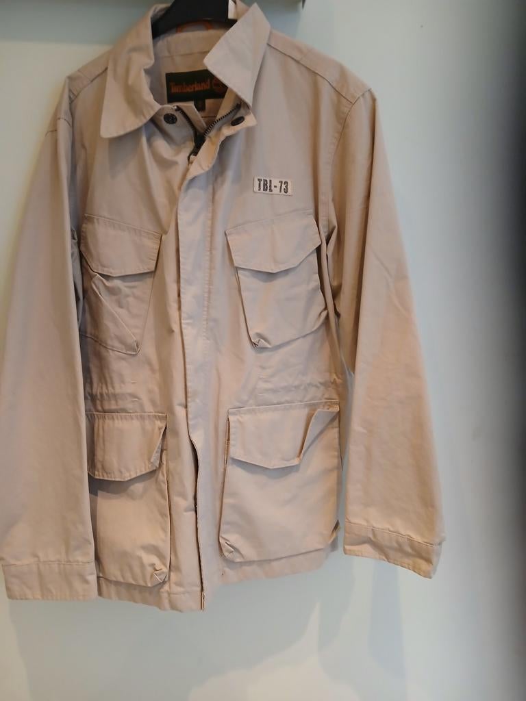 beige Timberland jas met 'TBL-73' 

Medium noeuw, Kleding | Heren, Jassen | Winter, Maat 48/50 (M), Nieuw, Ophalen of Verzenden