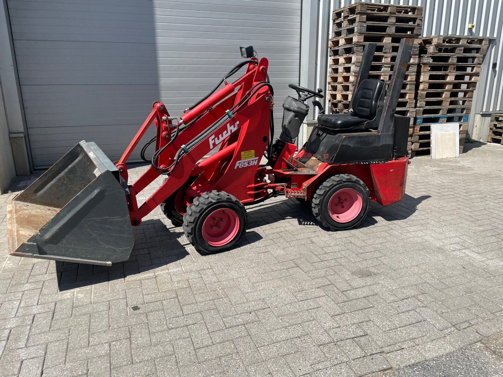 minni schovel /kniklader, Ophalen, Wiellader of Shovel