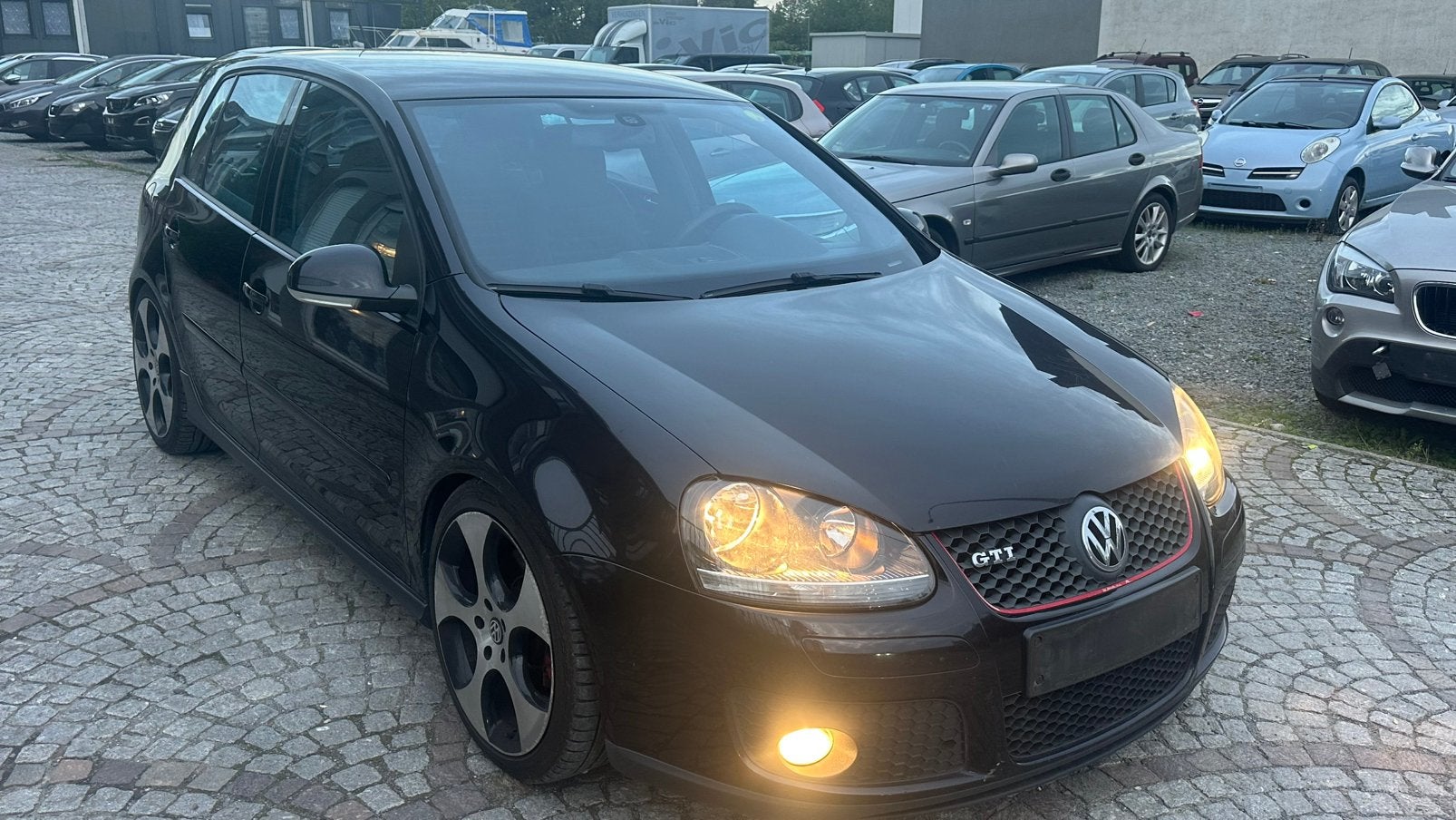 VOLKSWAGEN GOLF GTI 2.0 benzine automaat 260 pk, Auto's, Automaat, Stof, Zwart, 4 cilinders