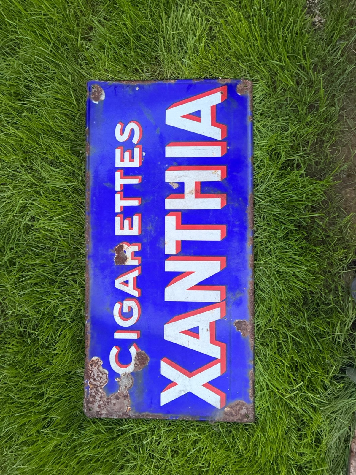 Plaque émaillée cigarettes xanthia, Enlèvement