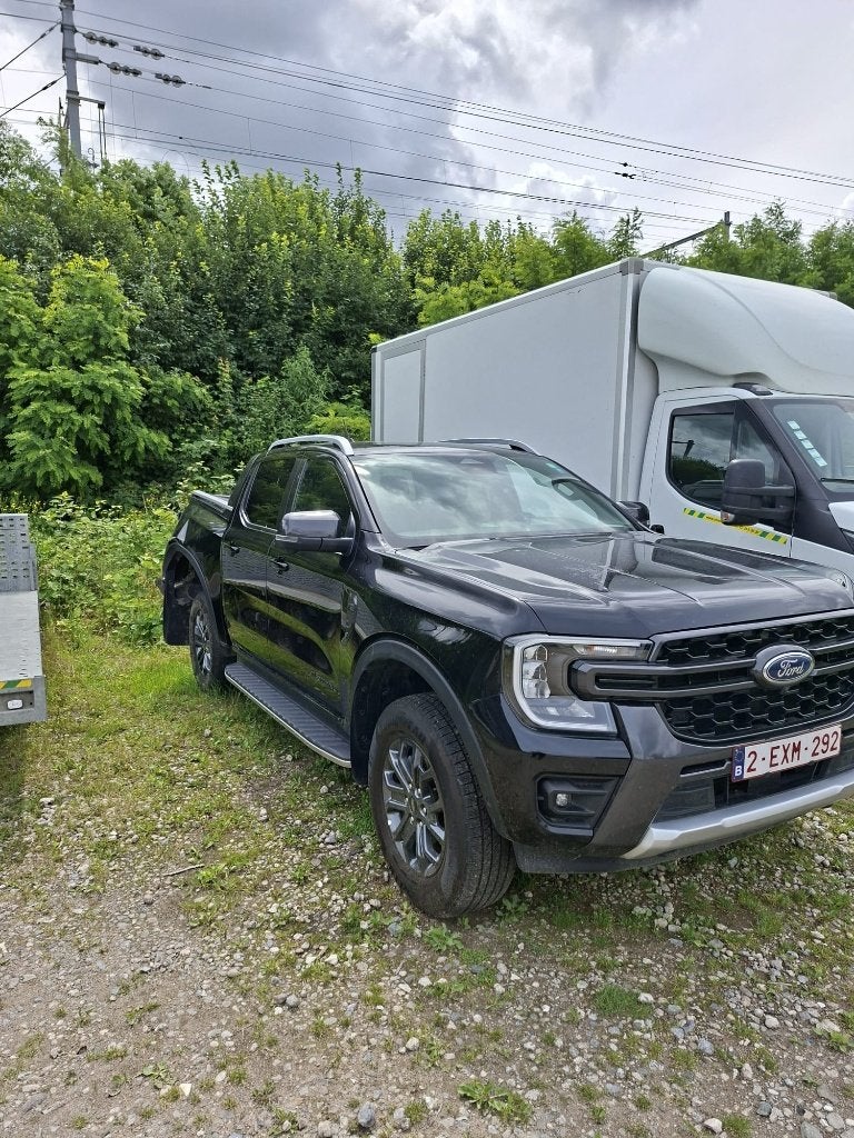 SCHADE: Ford Ranger Wildtrak 2.0 TDCi 205pk 4x4 Automaat BTW, Auto's, Automaat, 3500 kg, 4 cilinders, Zwart