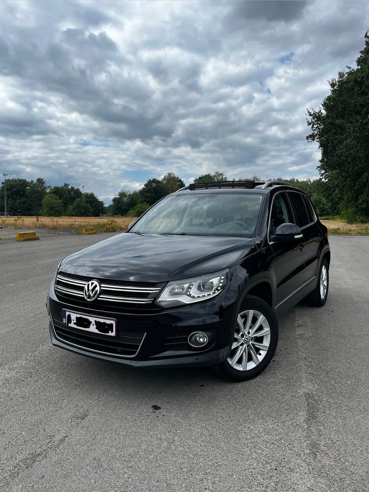 VW Tiguan 2.0 TDI 140pk 4Motion Full Option Leder Xenon, Autos, Volkswagen, Cuir, Euro 5, Achat, Noir