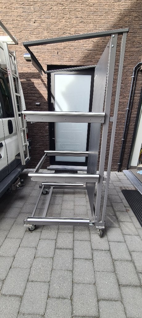 uitschuifbare draagarmstelling op wielen, Enlèvement