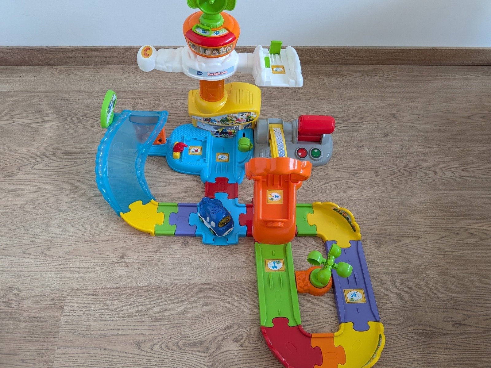 Luchthaven + autootje Vtech, Ophalen