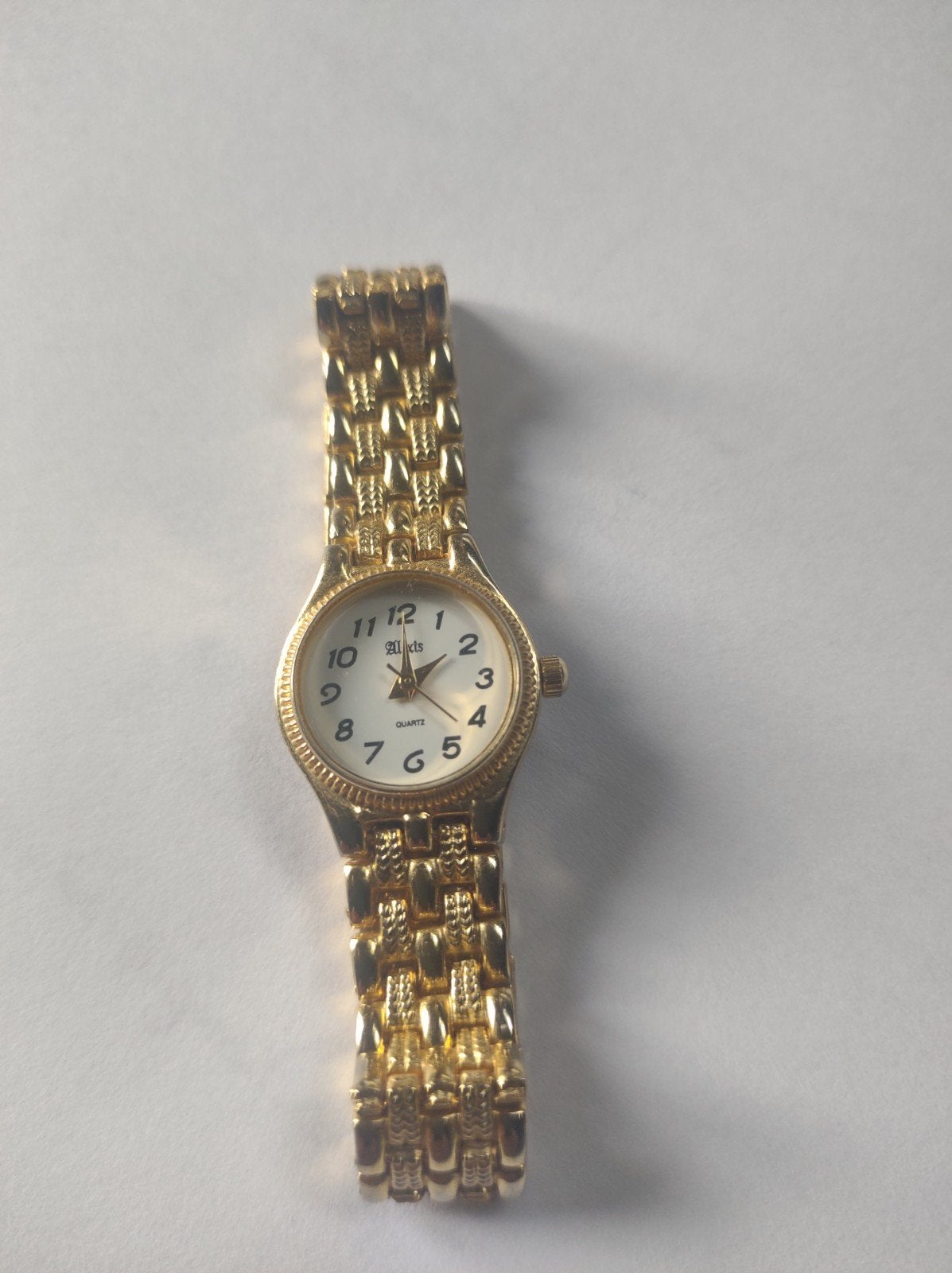 Montre dorée et quartz, Envoi, Argent