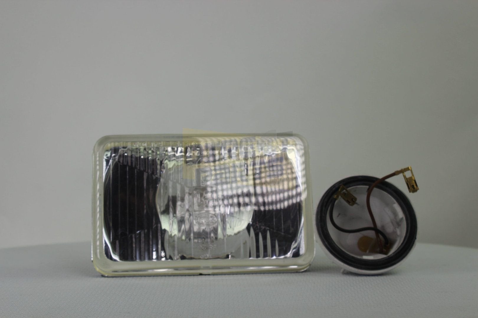 Mazda 929/ Nissan Laurel koplamp (L/R)   1KB003177061 RESTPA, Neuf, -, -, -