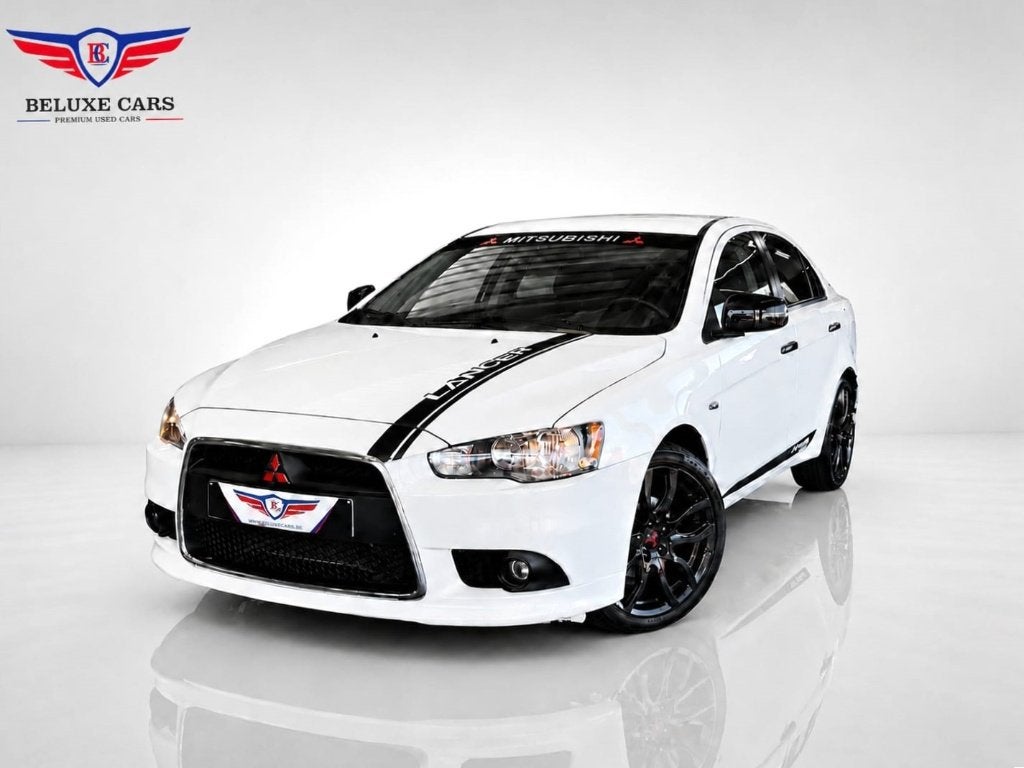 LANCER 1.6i SEDAN *SPOILER*SCHERM*CLIM*, Auto's, Mitsubishi, Voorwielaandrijving, 4 deurs, Stof, Start-stop-systeem