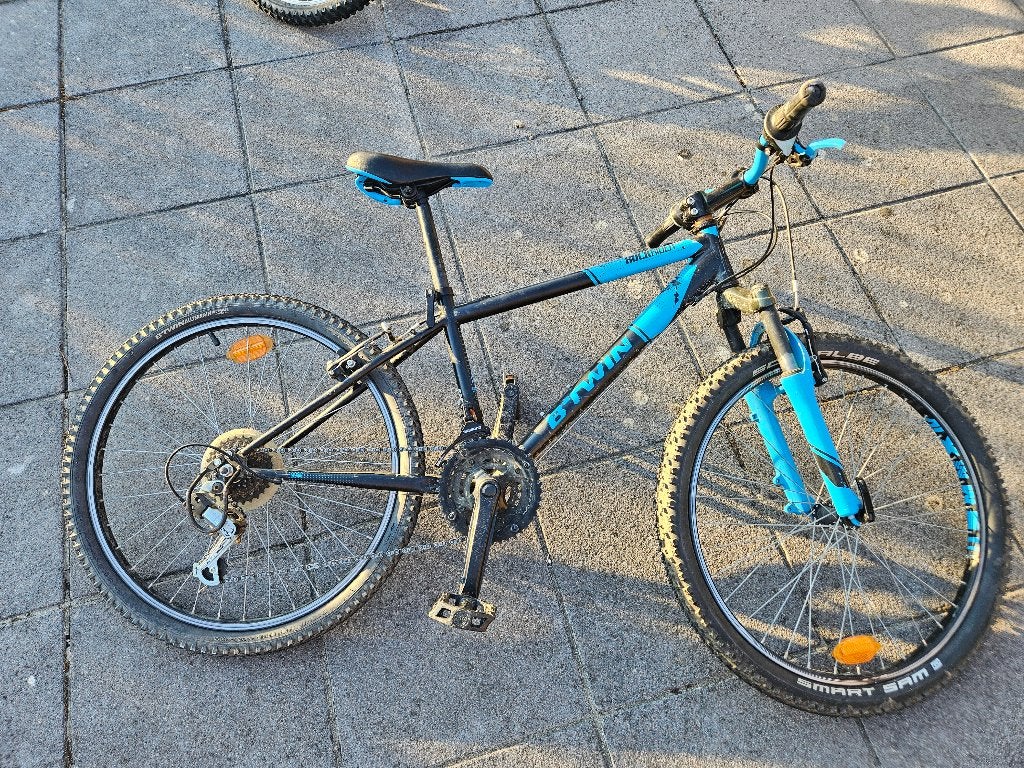 24 inch fiets (8 tot 11 jaar) BTWIN decathlon Rockrider 500, Ophalen, 20 inch of meer, Gebruikt, Velgrem