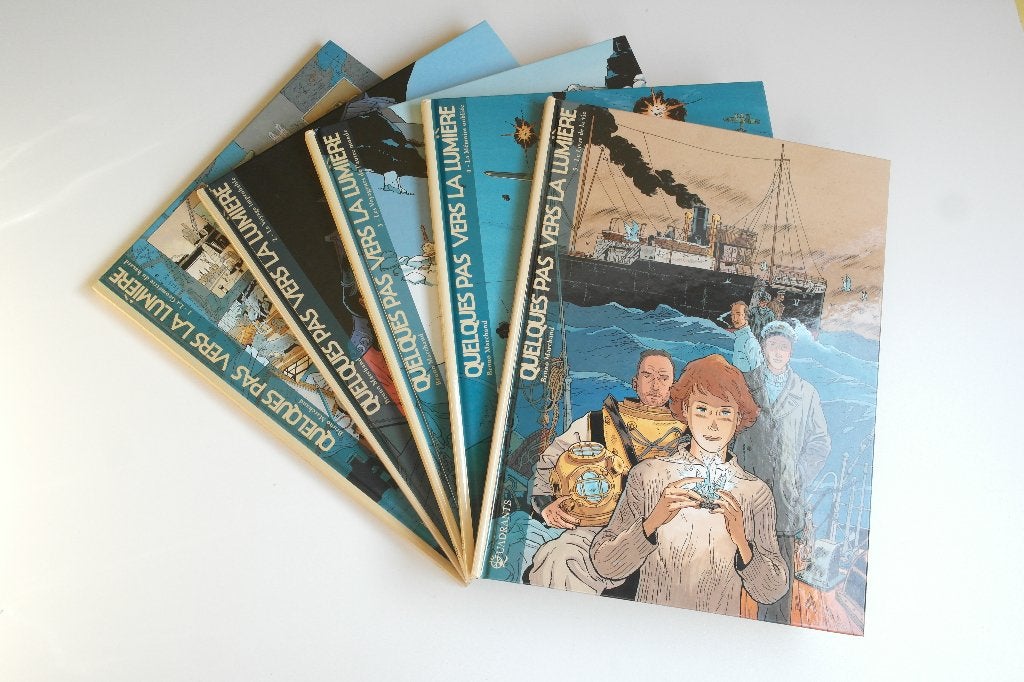 Bd QUELQUES PAS VERS LA LUMIERE 1 à 5 (EO état neuf), MARCHAND, Complete serie of reeks, Ophalen of Verzenden, Zo goed als nieuw