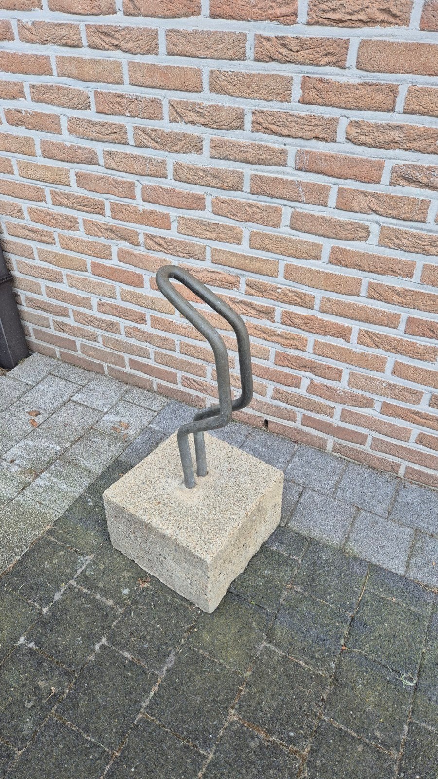 stalen fietsbeugel met betonvoet, Ophalen