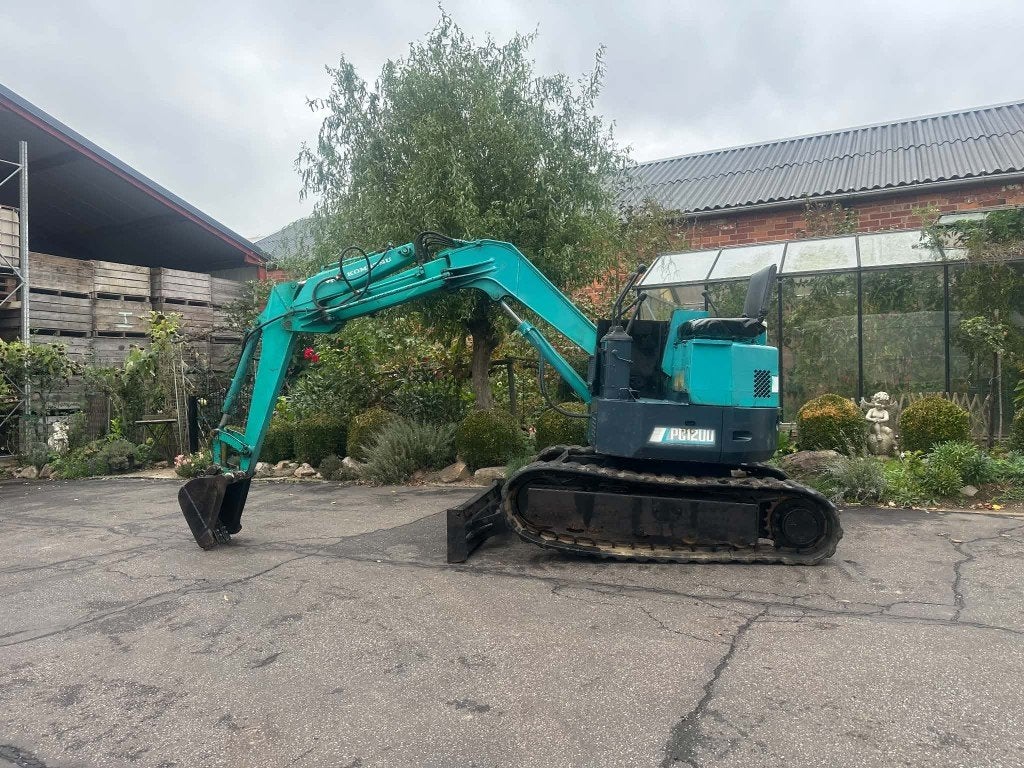 MINI-PELLETEUSE/EXCAVATRICE KOMATSU 2TON INDOOR TURNER, Articles professionnels, Enlèvement, Excavatrice