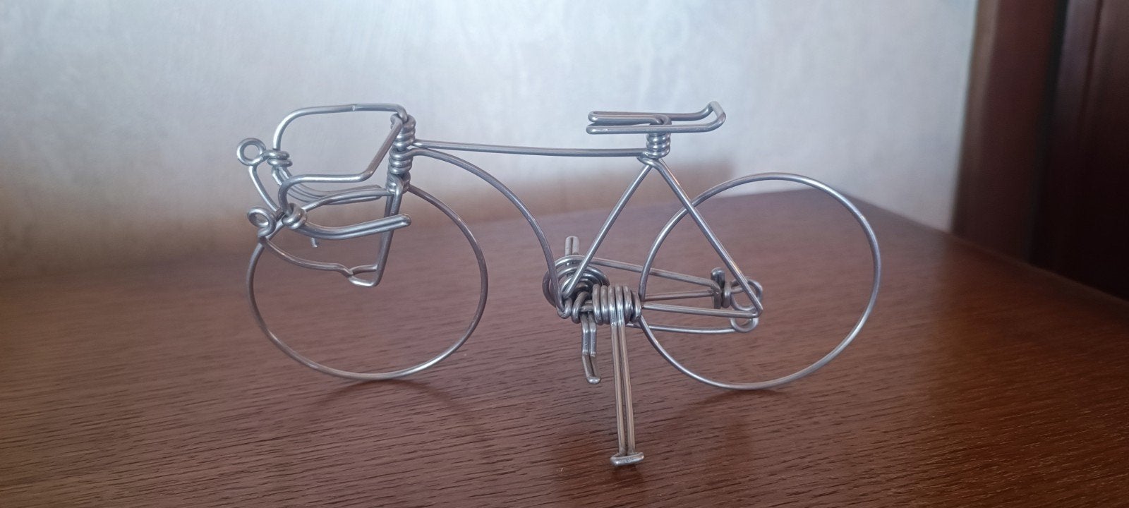 Ijzerdraad fiets, Ophalen