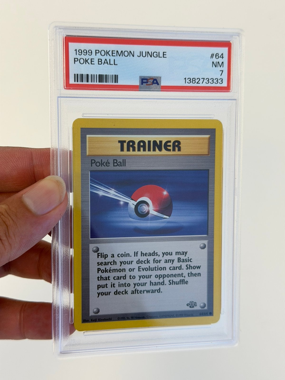 Pokémon Poké Ball 64/64 Jungle PSA 7 Vintage WOTC #64 1999, Enlèvement ou Envoi, Comme neuf, Cartes en vrac, Foil