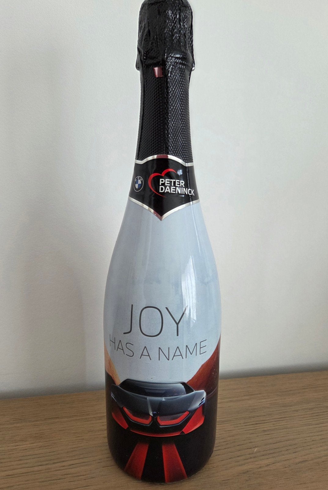 fles cava van BMW, Ophalen