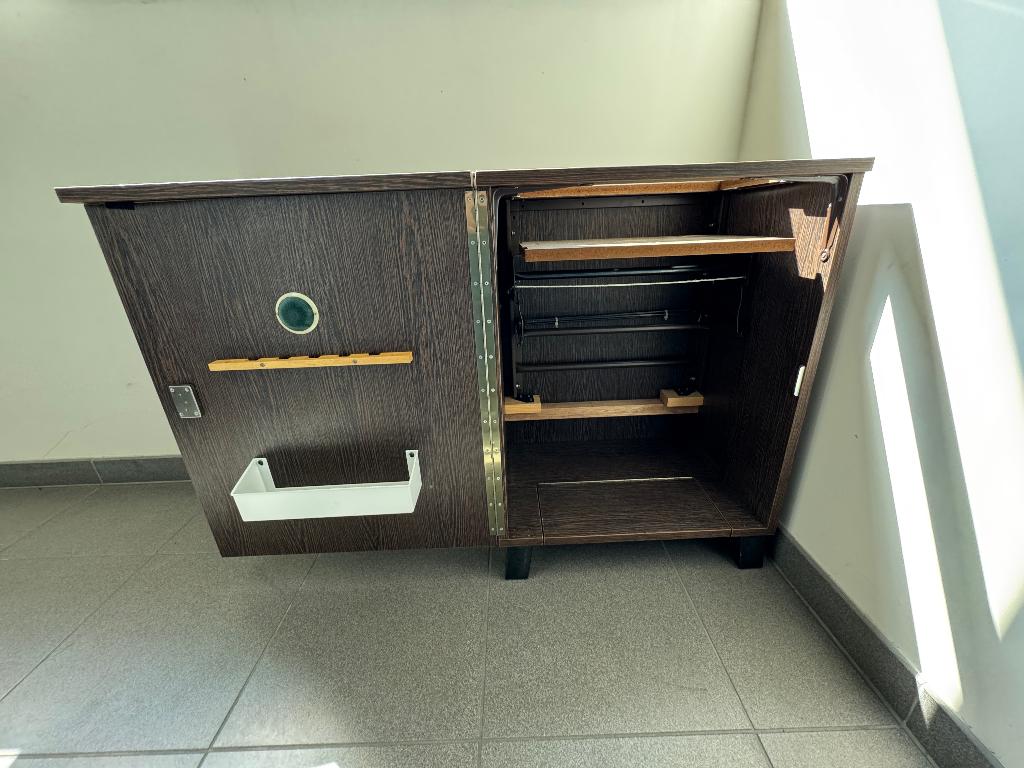 Armoire pour machine à coudre, Enlèvement