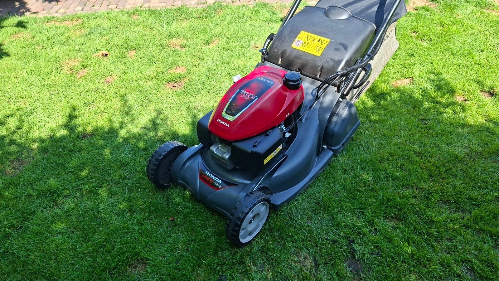 Honda hrx 476  benzine walsmaaier ( zie omschrijving), Tuin en Terras, Grasmaaiers, Cirkelmaaier, Zo goed als nieuw, Benzine-grasmaaier