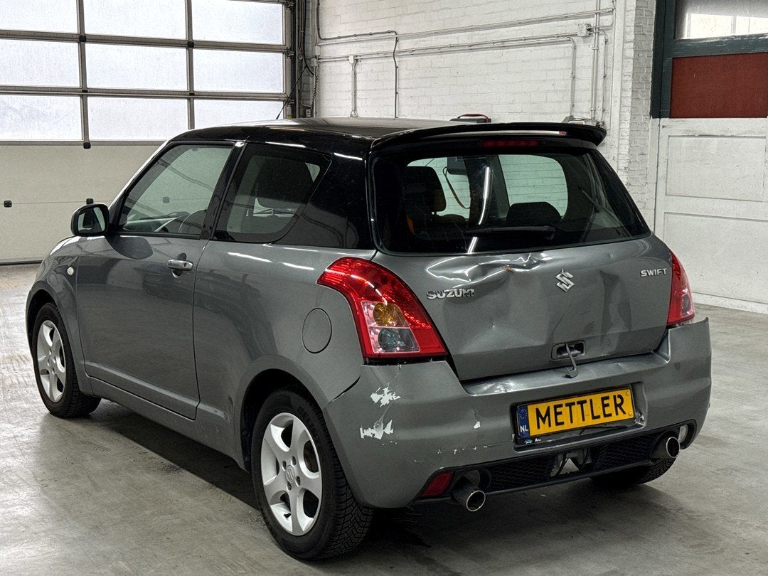 Suzuki Swift 1.3 Comfort | Schadevoertuig, Autos, Suzuki, 945 kg, Argent ou Gris, Achat, 140 g/km