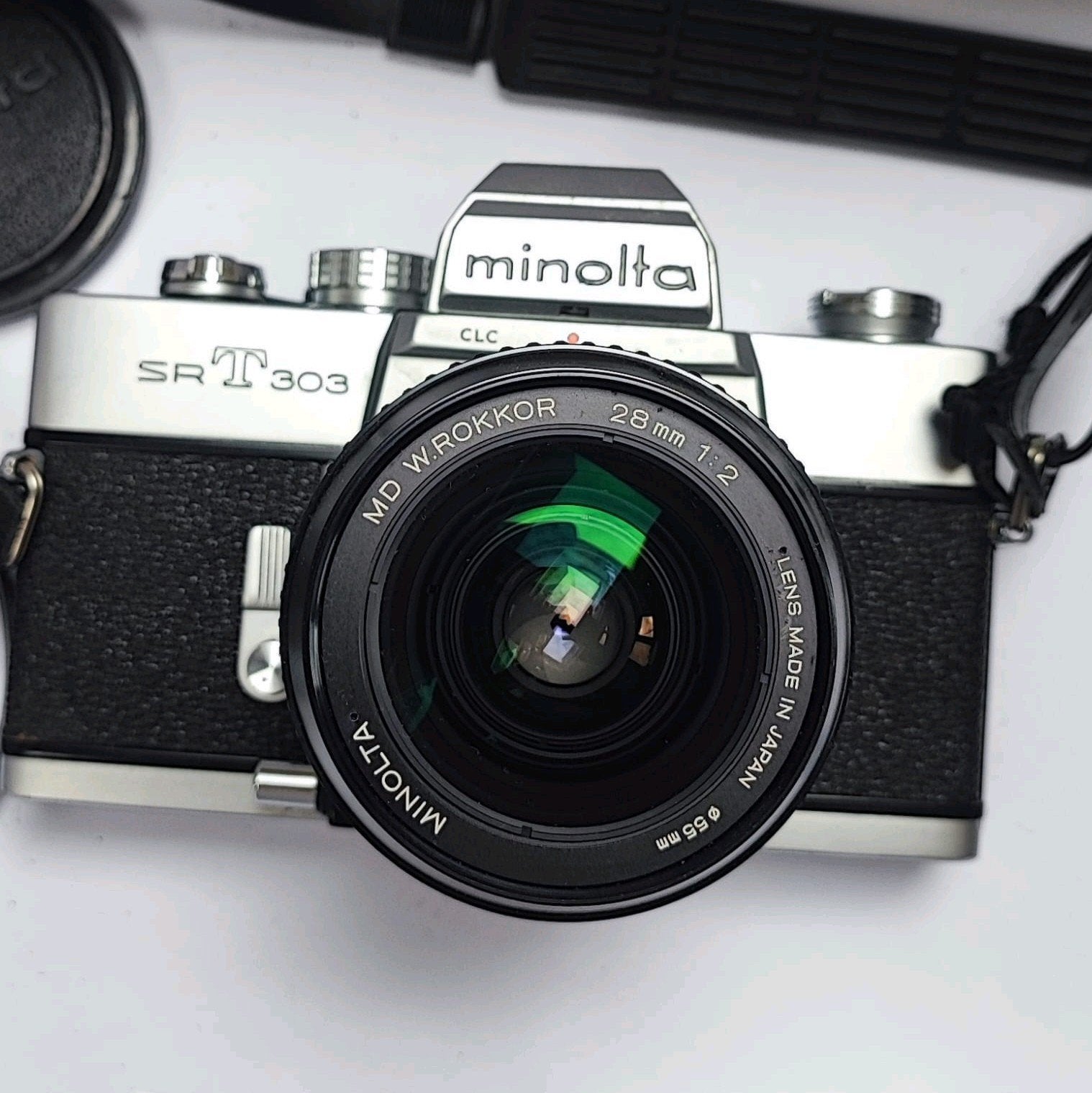 Minolta SR-T 303 avec
Objectif MD W. Rokkor, Audio, Tv en Foto, Fotocamera's Analoog, Ophalen of Verzenden, Minolta