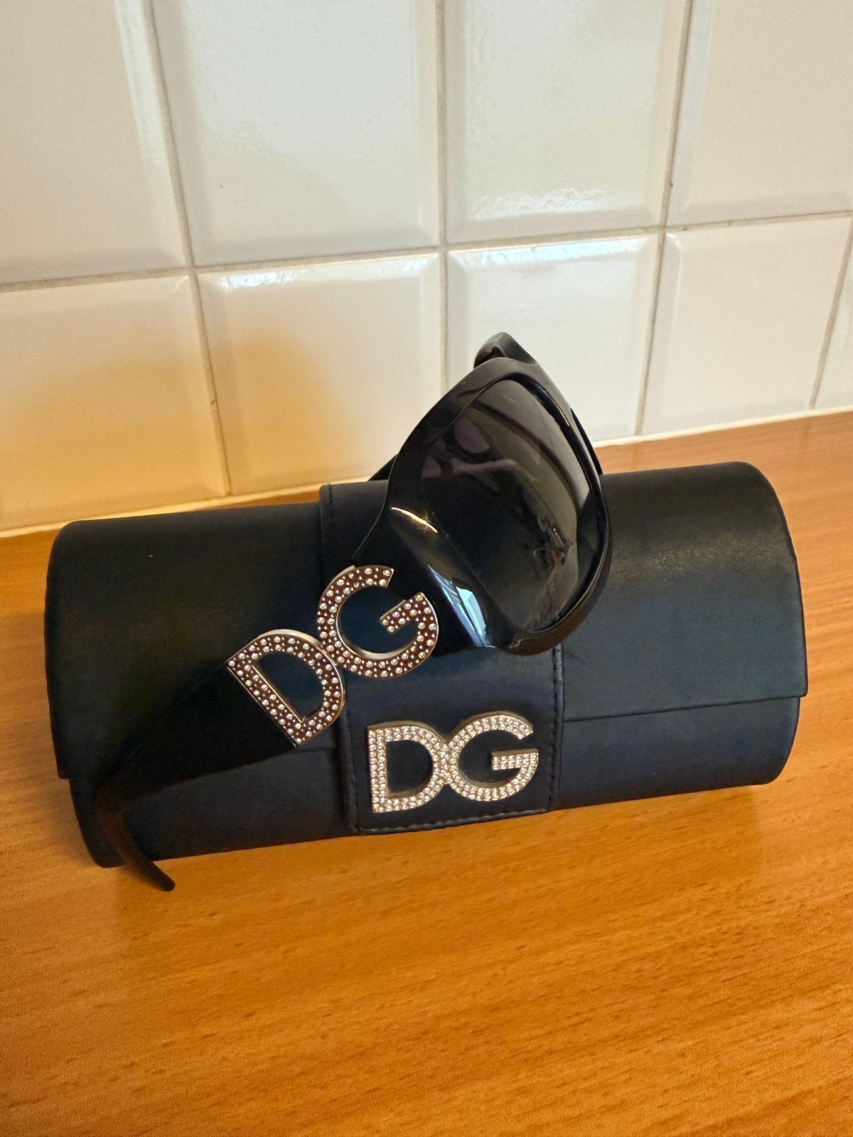 Zonnebril Dolce & Gabbana, Ophalen