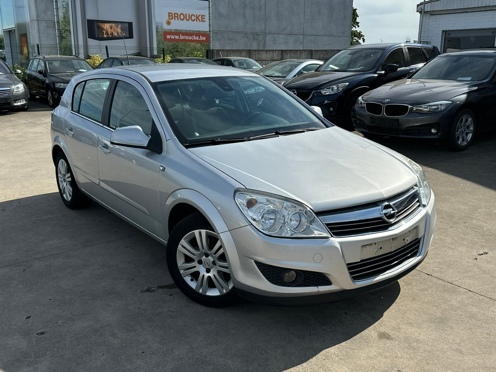 Opel Astra 1.4 L benzine genoeg optie eerste eigenaar, Auto's, Zwart, 4 cilinders, Leder en Stof, Bedrijf