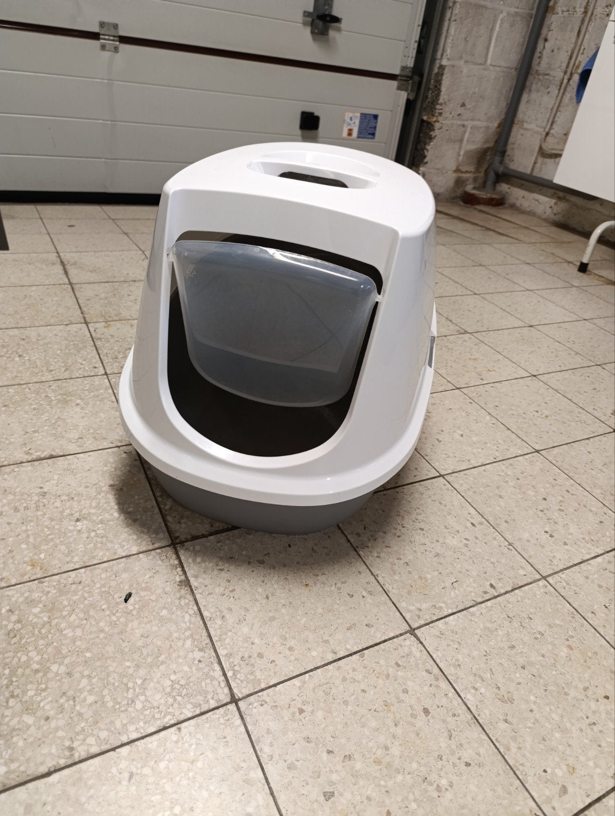 Kattenbak, Ophalen