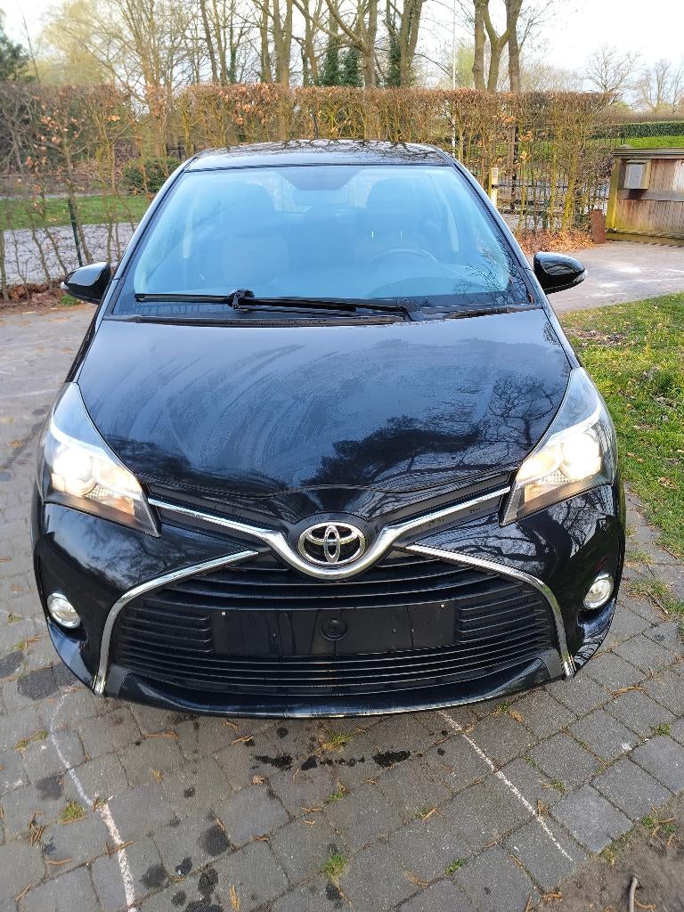 Toyota Yaris 1.33 VVTi 54333km (bj 2015) 1 jaar garantie !!!, Voorwielaandrijving, Euro 5, Stof, Zwart