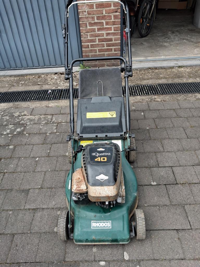 Grasmaaier Op benzine, Ophalen