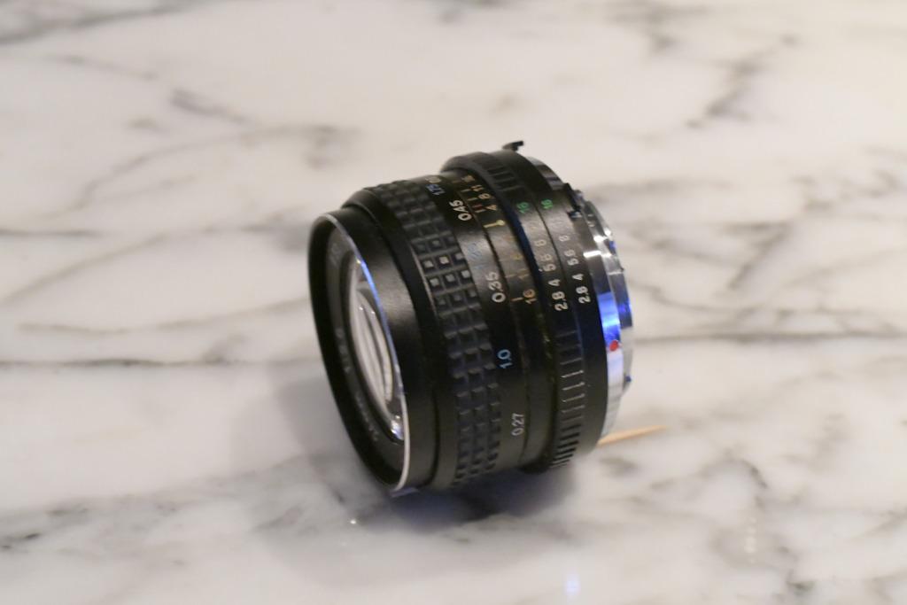 Tokina RMC 24mm/ f2.8 voor Minolta nr.8300549, Ophalen of Verzenden, 1980 tot heden, Lens of Lenzen