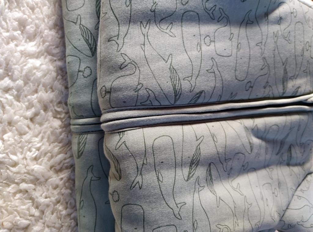 NIEUWE Babyslaapzak Jollein 4 seasons 70 CM Whales ash green, Ophalen, Nieuw, 70 tot 85 cm, Slaapzak