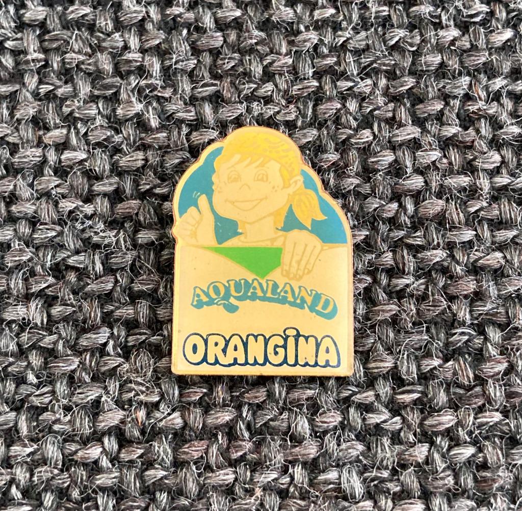 PIN - AQUALAND - ORANGINA, Envoi, Utilisé, Marque, Insigne ou Pin's