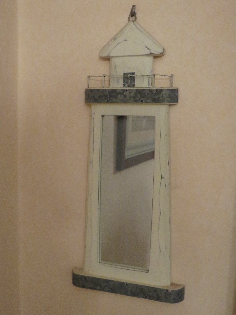 Spiegel in de vorm van een vuurtoren, Ophalen