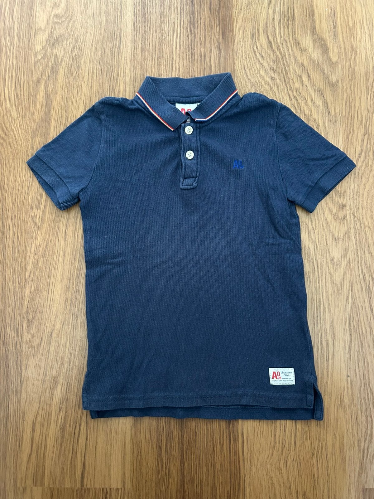 Mooie donkerblauwe polo AO76 maat 6 jaar, Ophalen of Verzenden, Zo goed als nieuw