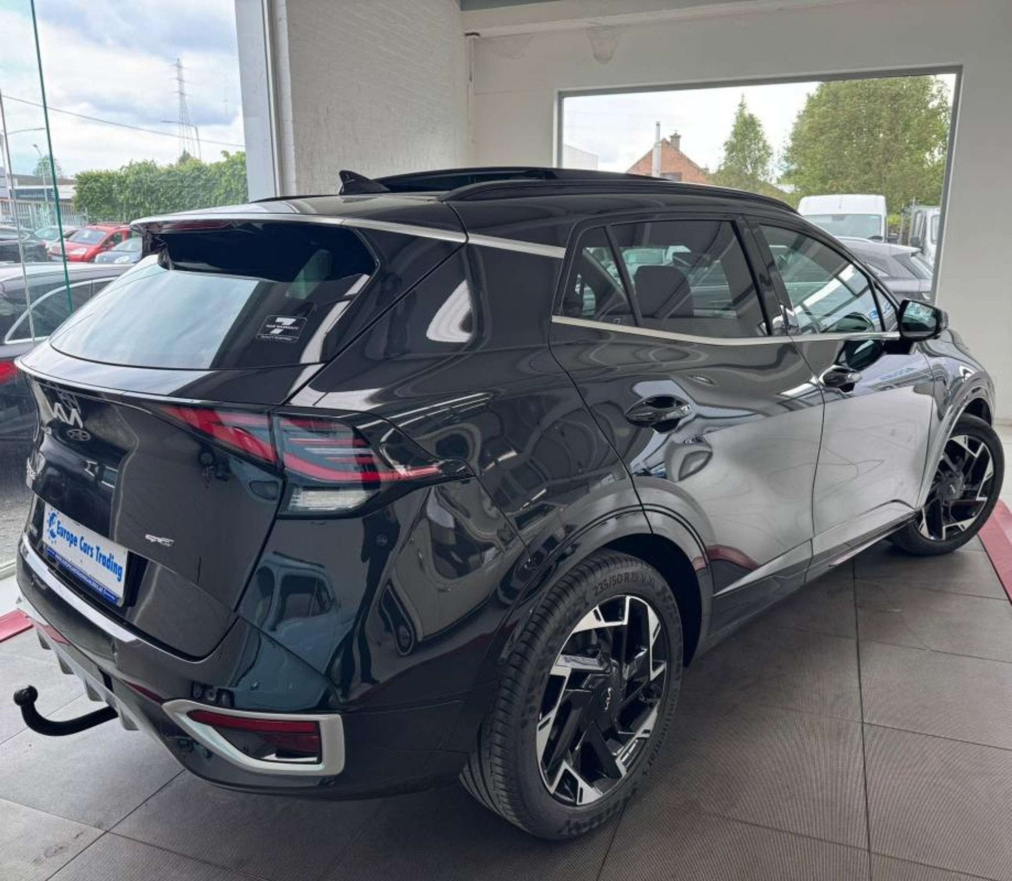 Kia Sportage GT LINE T.O PANO CUIR CARPLAY 1ÈRE MAIN GAR 12, Auto's, Automaat, Gebruikt, Zwart, Leder