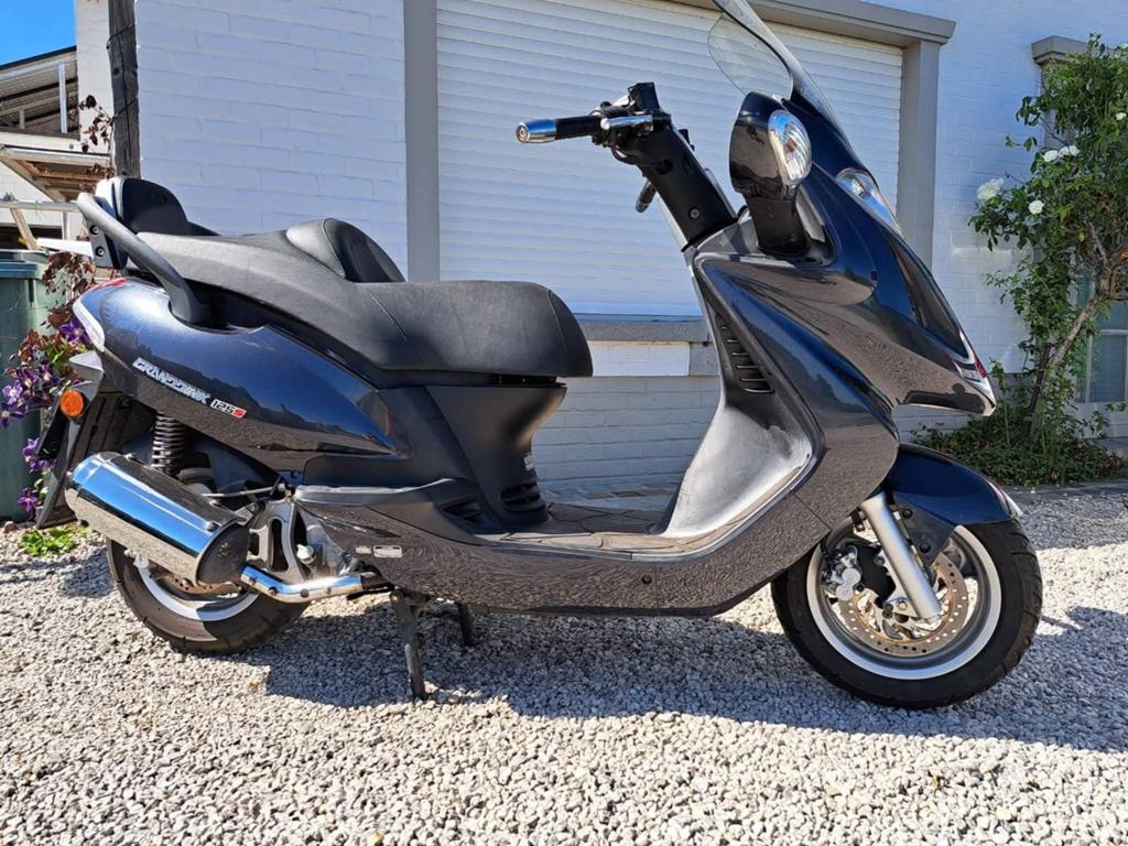 En parfait état : Kymco Granddink S 125 à peine 6 500 km, Enlèvement