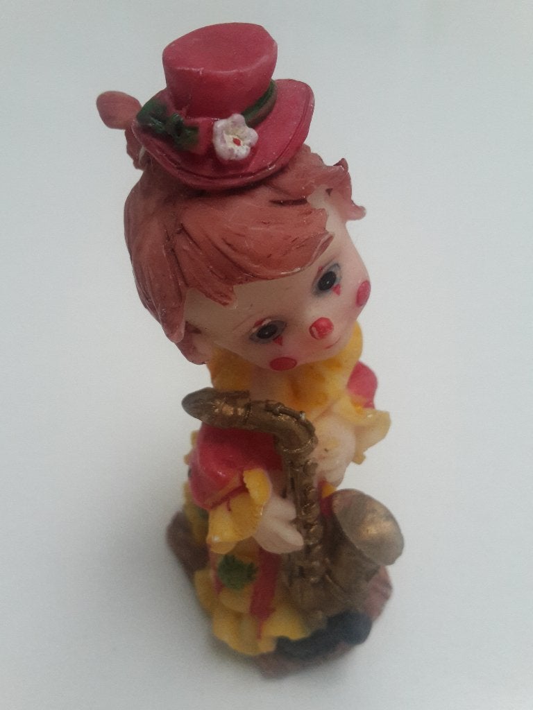 Mooi beeldje van een clown met saxofoon, 8 cm, Enlèvement ou Envoi, Comme neuf, Animal